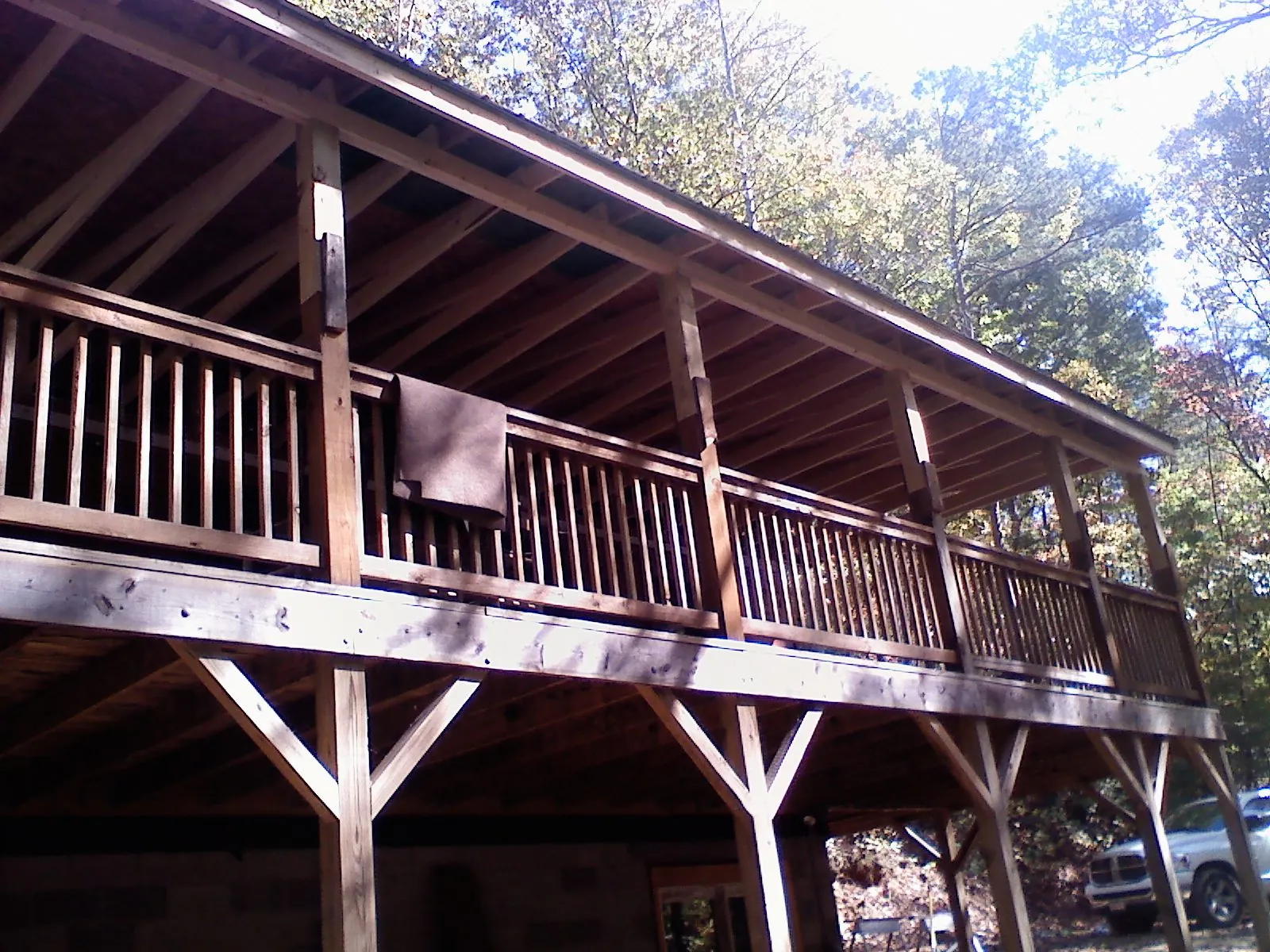 Timber framing under a new elevated porch and deck — Roof Leak Repair in Jadwin by Roofing Brothers